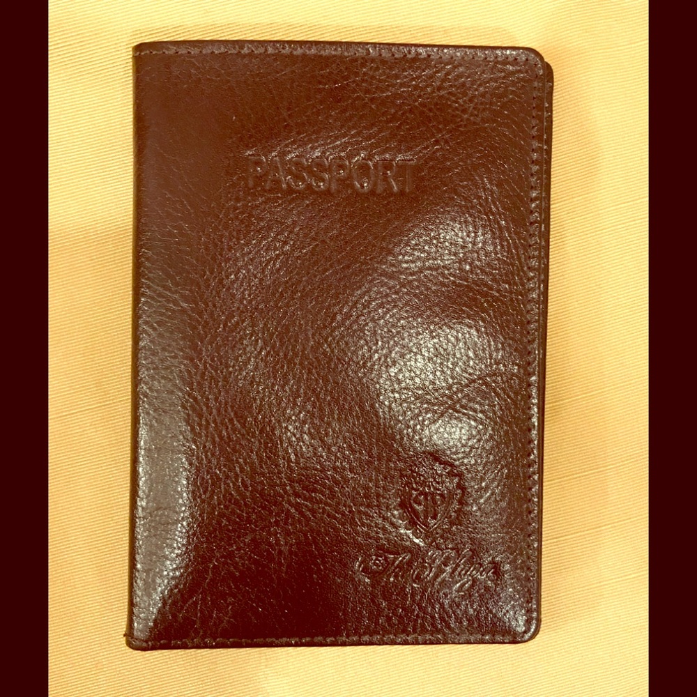 Brown leather passport and card holder The Plaza.